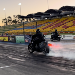 Elliott Andrews does a burnout on a Harley-Davidson motorcycle at the quarter mile at Sydney Dragway on Bike Night